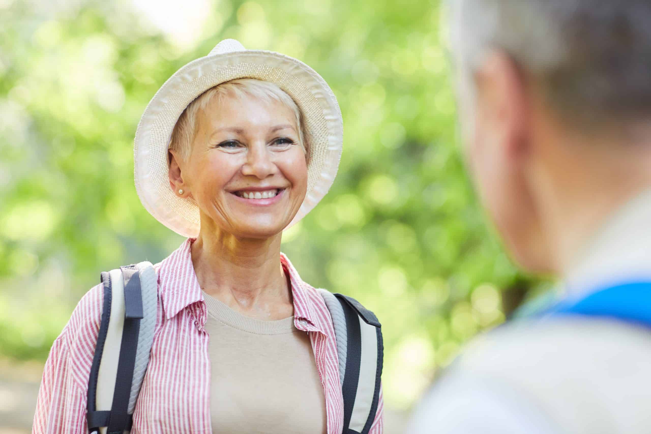 Happy woman smiling to man