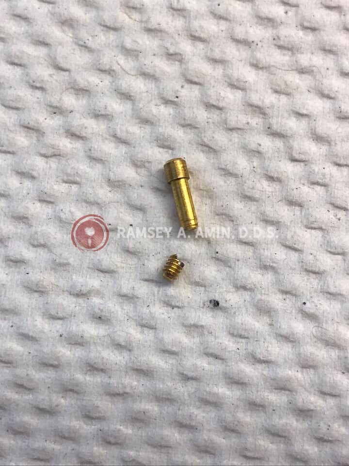 broken implant screw by Dr. Amin